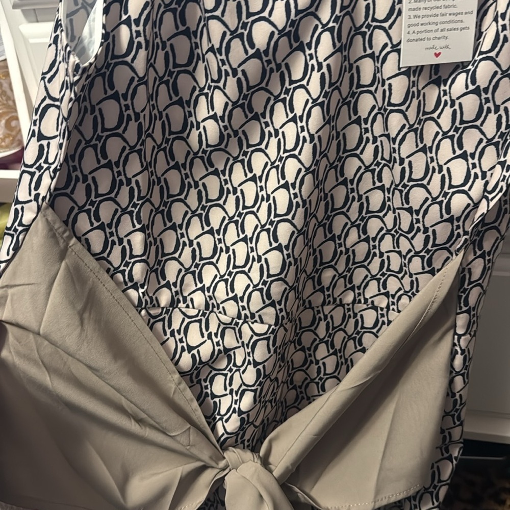 Elegant Patterned Jumpsuit in tan with sash that ties at waist - Picture 7 of 10